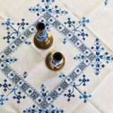 Delft brass and porcelain candlestick duo