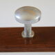 Wooden and stainless steel coat holders from the 1920s