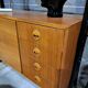 Armoire design en teck Musterring avec pieds noirs
