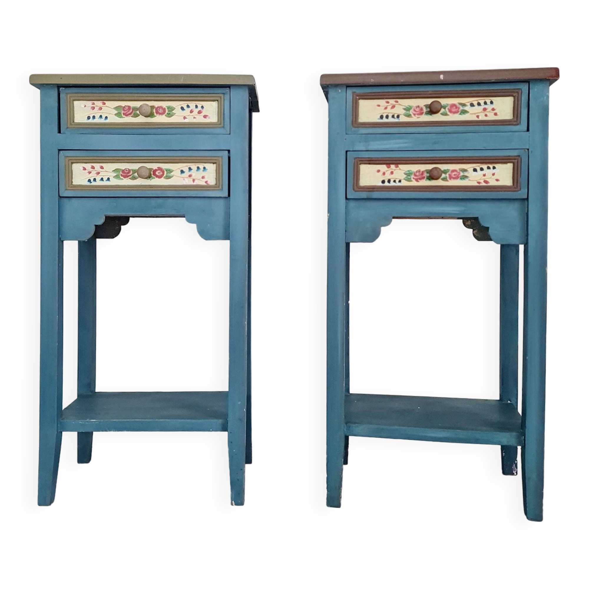 Blue wooden bedside tables with floral patterns