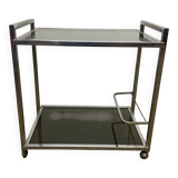 1970s coffee table in brass with a double smoked glass top.