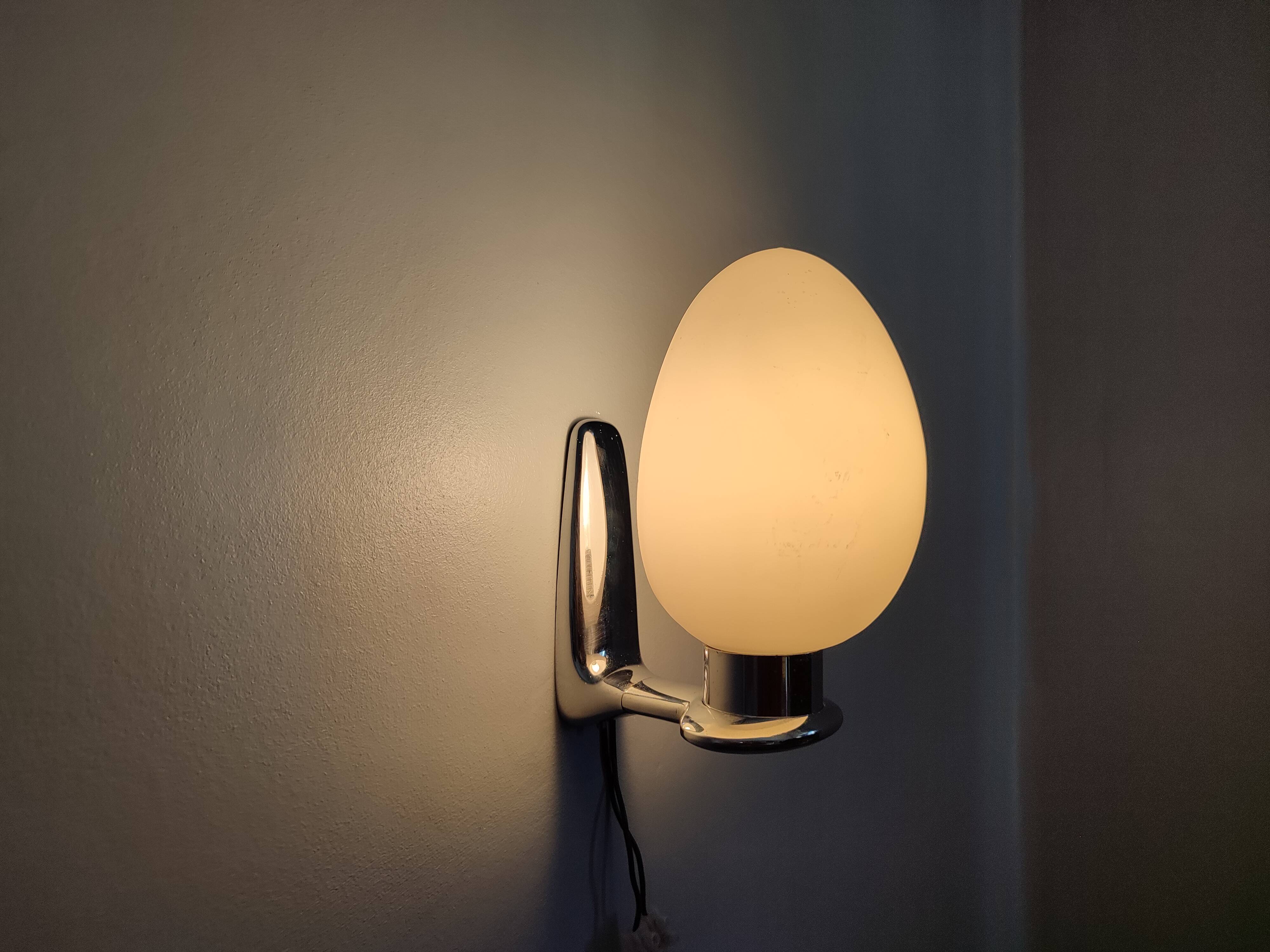 Pair of ouefs sconces in opaline and vintage chromed metal
