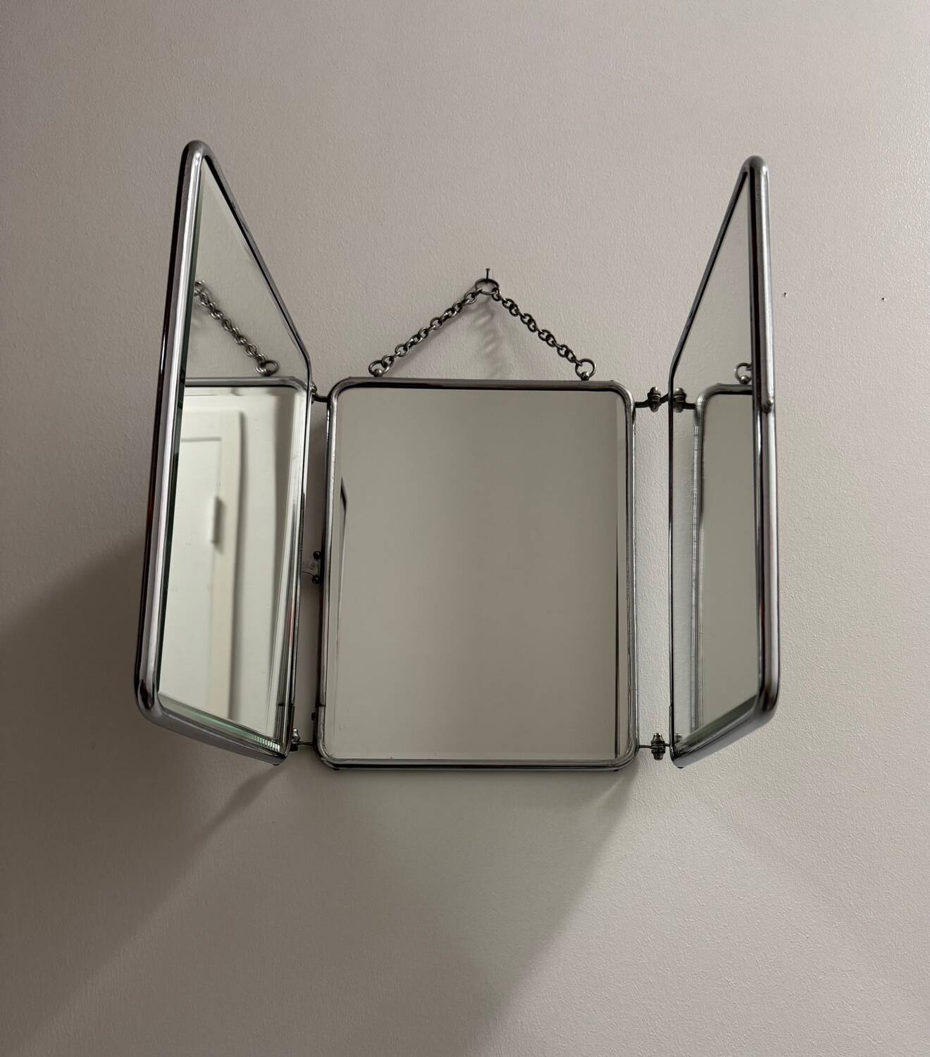 Bevelled triptych barber mirror from the 1950s.