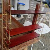 Gold metal wall shelf