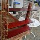 Gold metal wall shelf