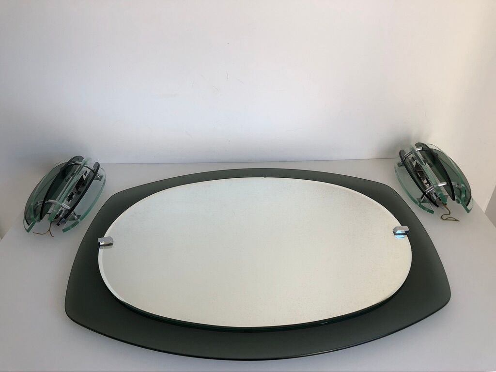 Veca mirror and 2 matching Veca wall lights made in Italy.