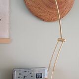 Articulated black and gold metal desk lamp