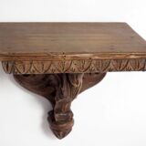 Carved wooden shelf
