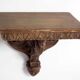 Carved wooden shelf