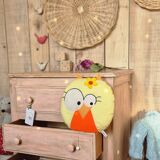 Small Parisian-style chest of drawers patinated in pink.