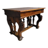 Antique desk in Renaissance style made of walnut from the late 19th century.