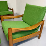 Living room sofa and Scandinavian design armchairs from the 1960s in green boucle.