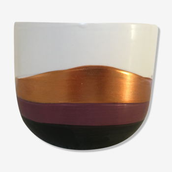 Ceramic pot holder with golden belt