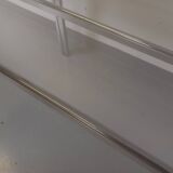 Vintage oval dining table in smoked glass and chrome metal, Space Age style.