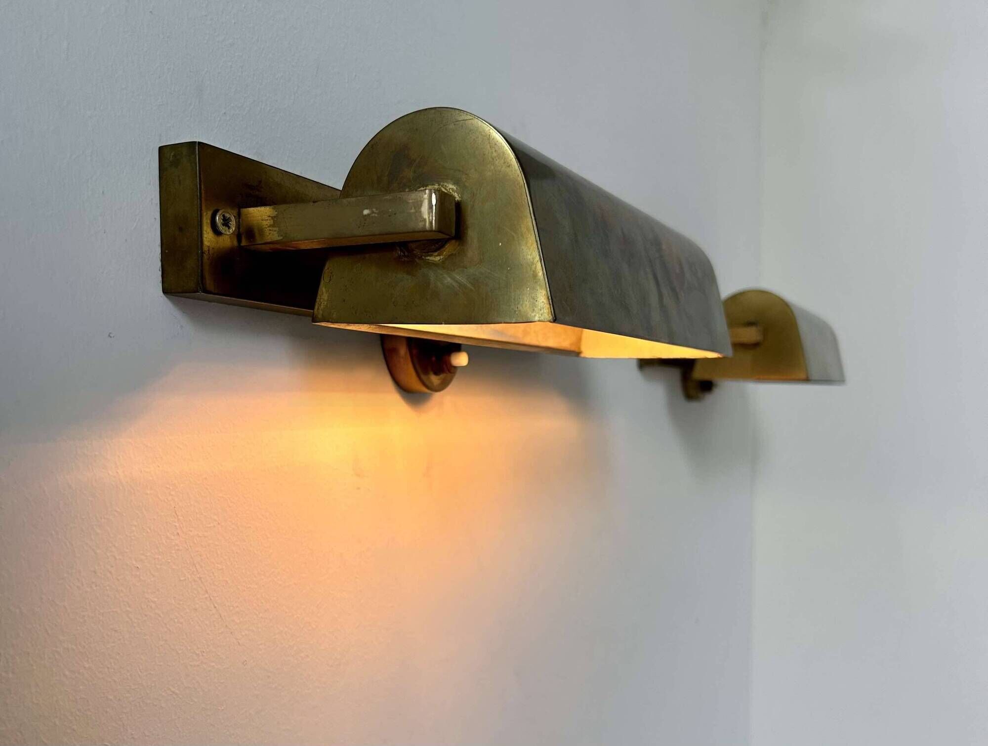 Pair of vintage modernist wall lights, adjustable in brass, France 1940