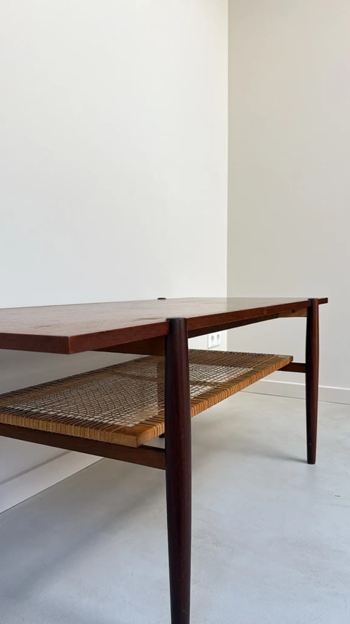 Vintage wooden coffee table with wicker lower shelf