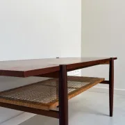 Vintage wooden coffee table with wicker lower shelf