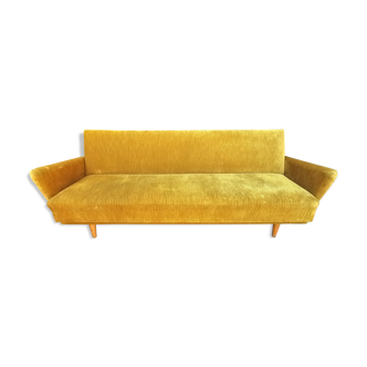 Convertible sofa in golden yellow velvet