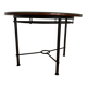Half-moon console grange in solid cherry wood and wrought iron with a glass top.