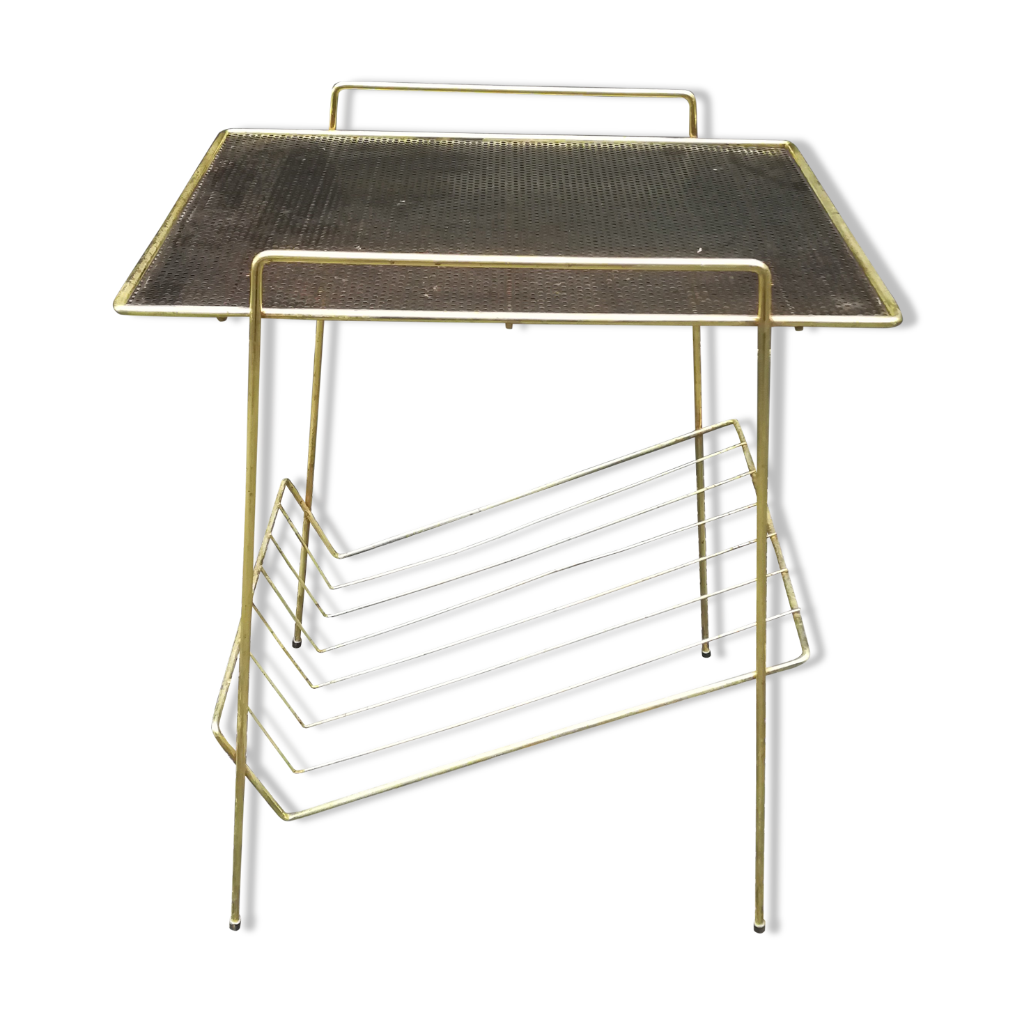 Gold sofa tip in perforated metal