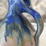 Vase, or pitcher, in enamelled stoneware with a bird's head, circa 1920