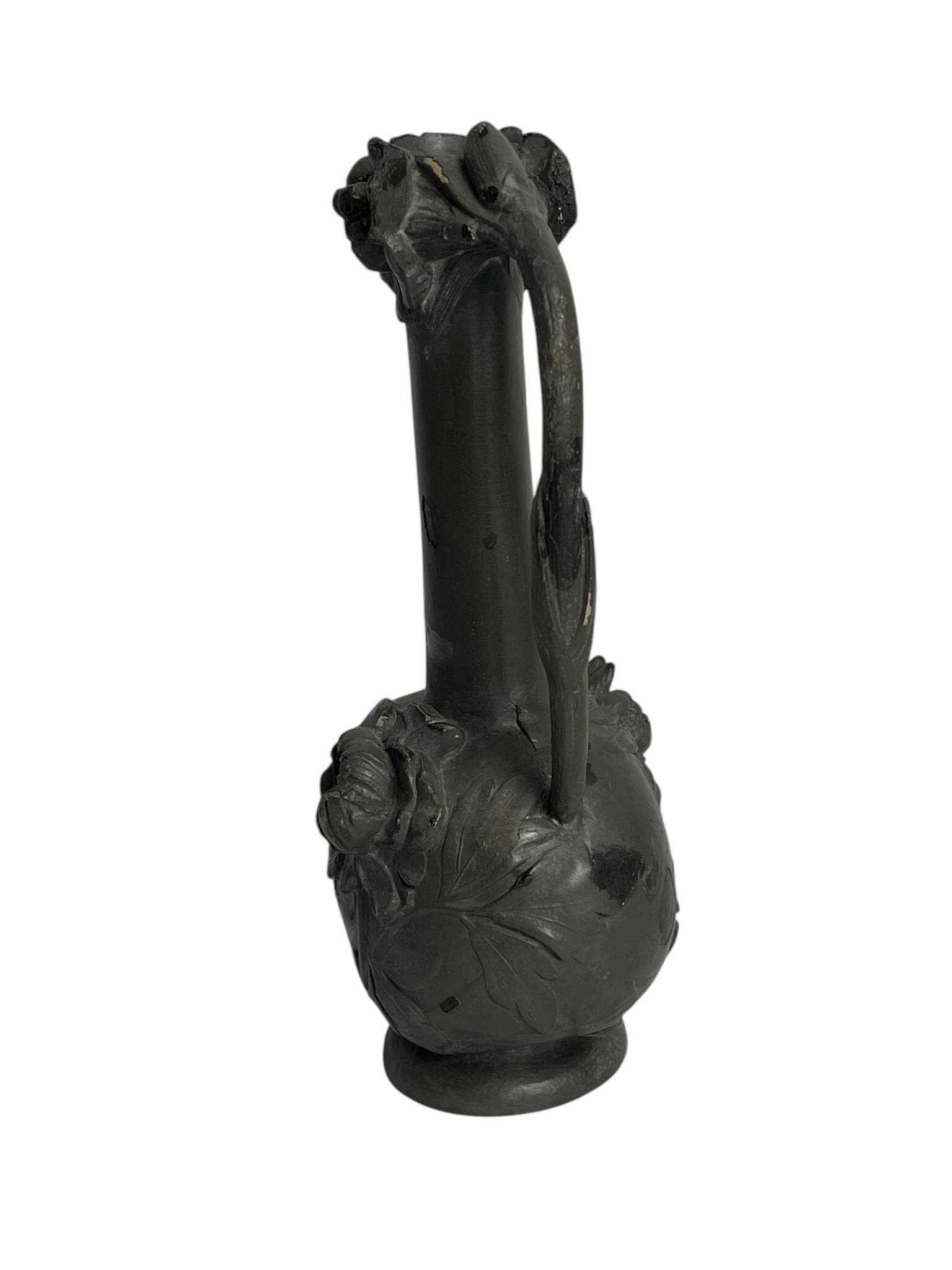 Art Nouveau, a single flower vase jug in pewter signed Petiz around 1900.