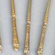 12 gilt metal teaspoons