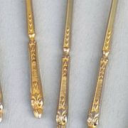 12 gilt metal teaspoons