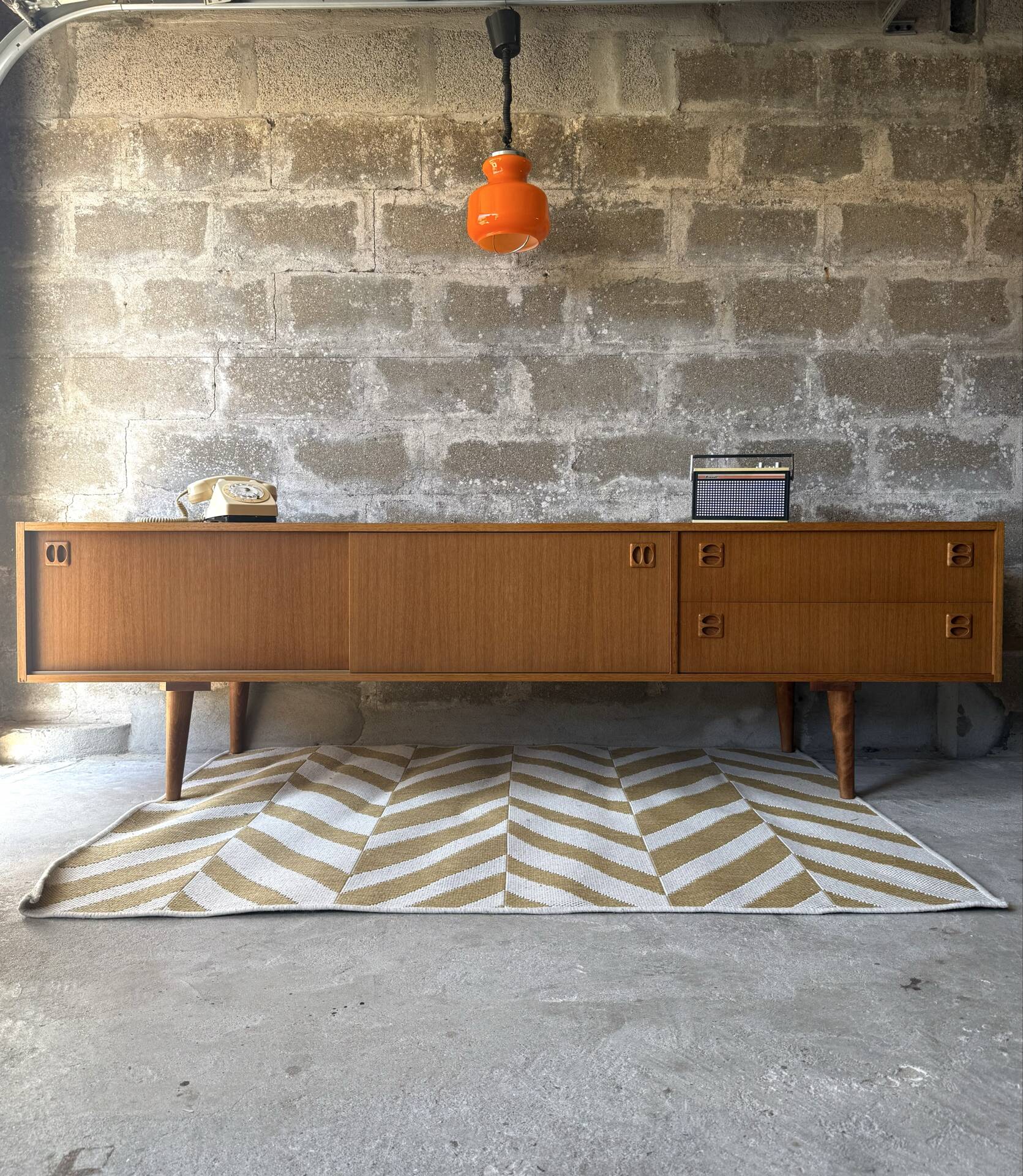 Scandinavian low sideboard in teak, 1970.