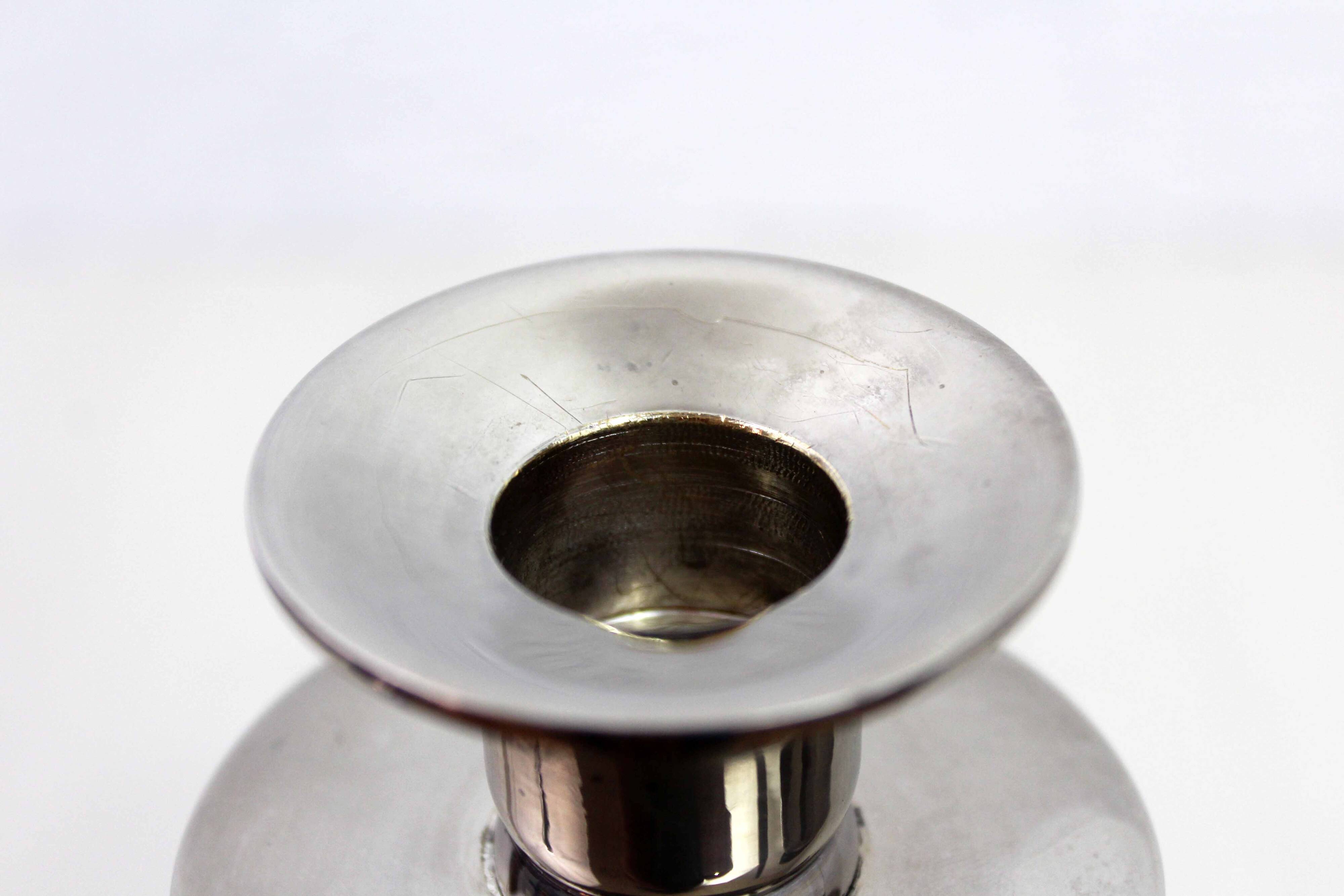 Pair of lucite and silver-plated metal candlesticks