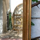 Antique mirror gilded with gold leaf (153x83)