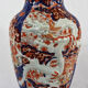 19th century Imari porcelain baluster vase with dragon relief decoration