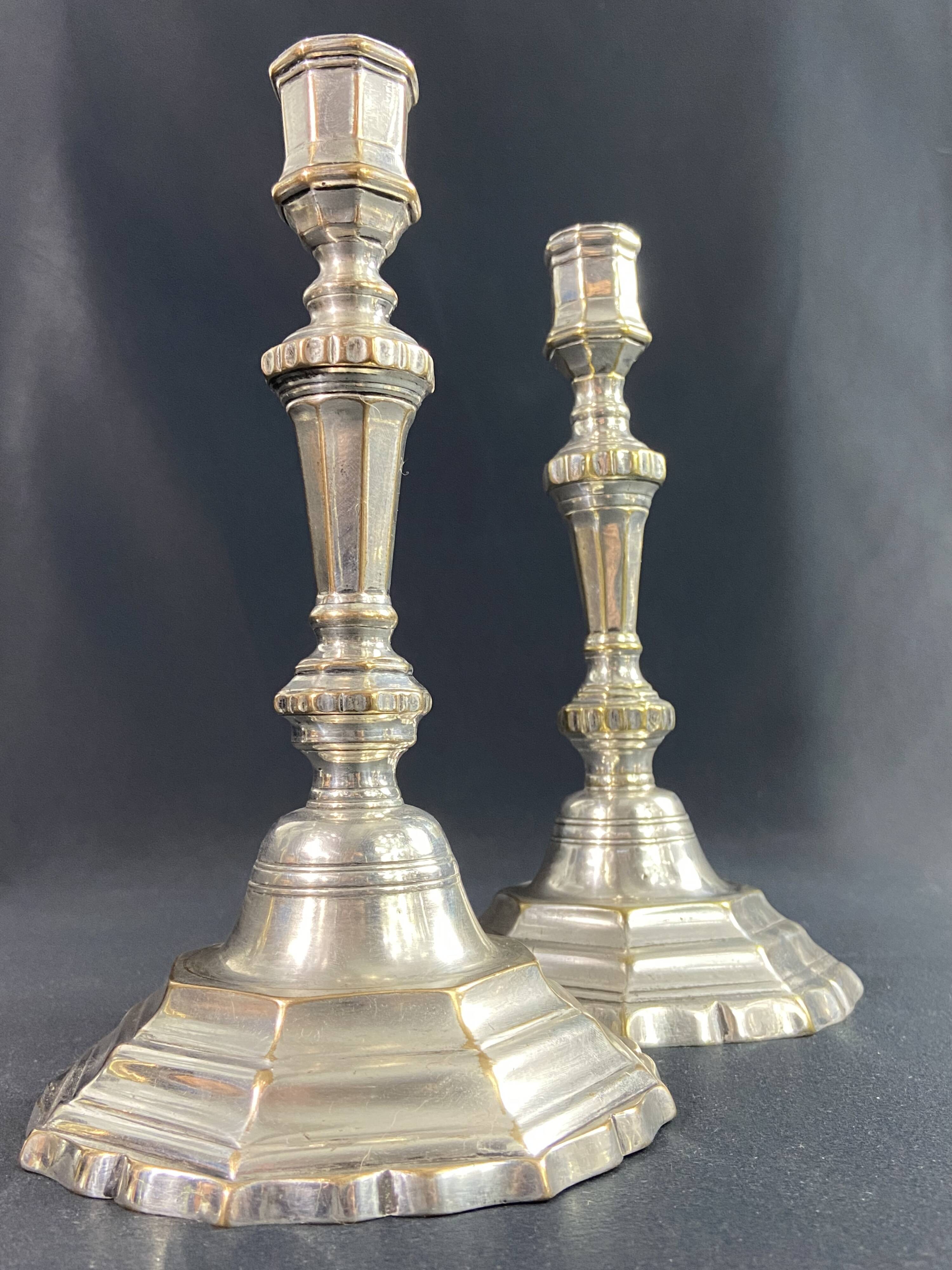 Pair of 18th century Regency candlesticks in silvered bronze