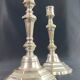 Pair of 18th century Regency candlesticks in silvered bronze