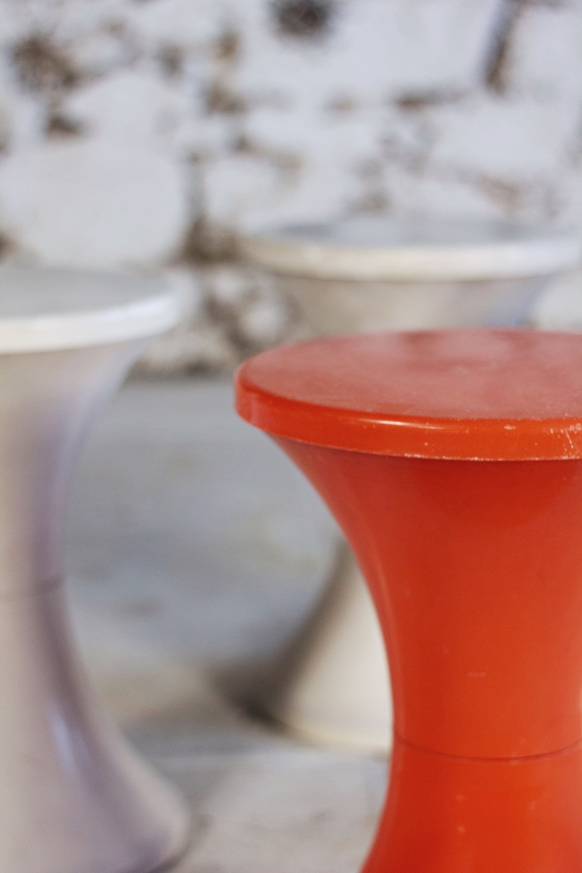 Dark orange Tam Tam stool by Henri Massonnet for Stamp, 1970