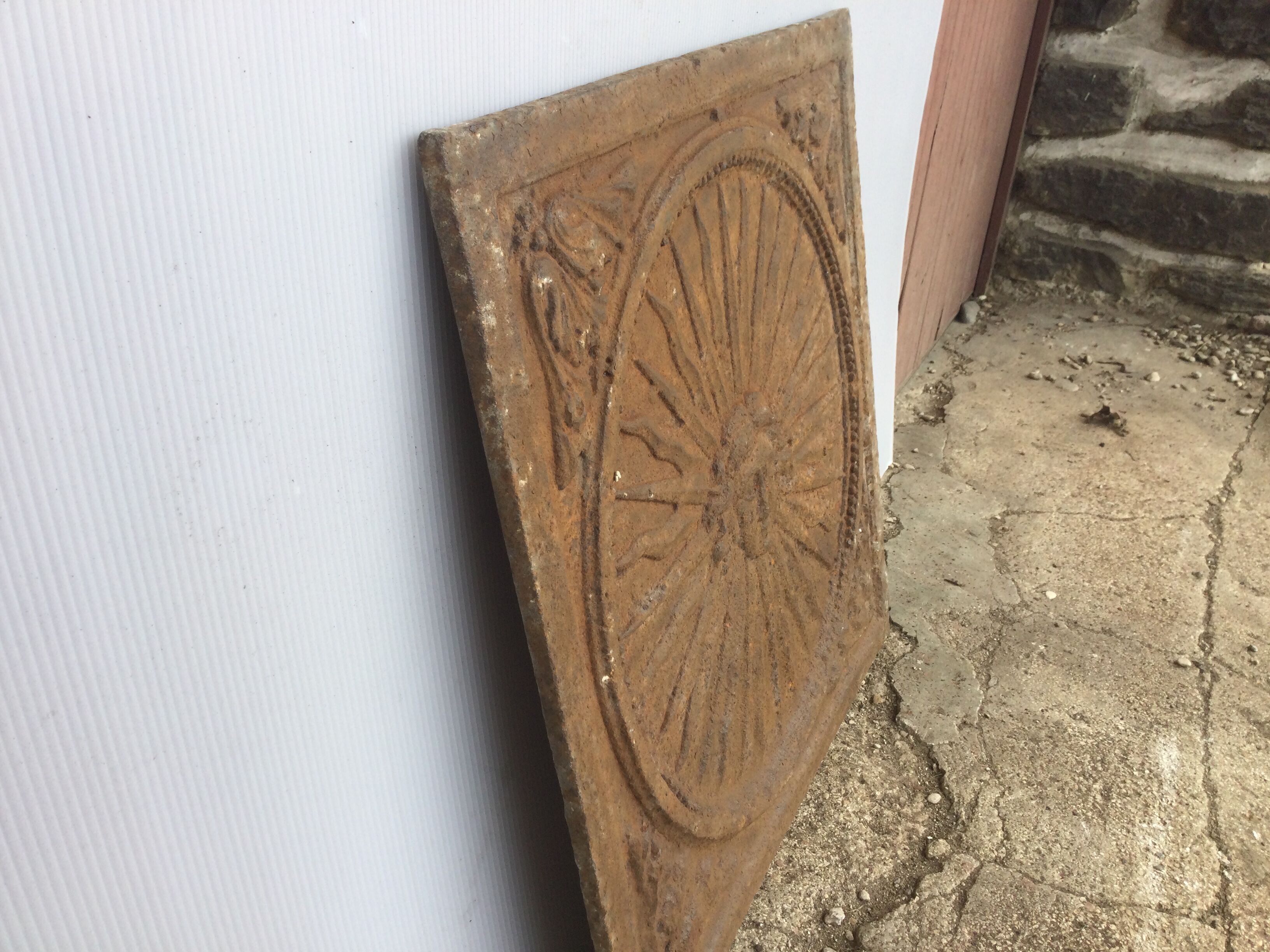 Plaque de cheminée roi soleil