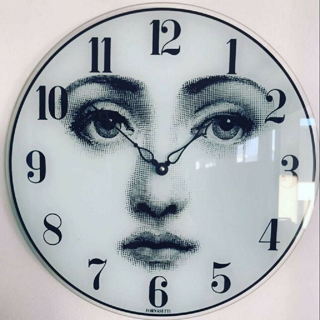Viso glass wall clock Lina Cavalieri Fornasetti