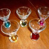 5 small glasses with colored bubble inclusions