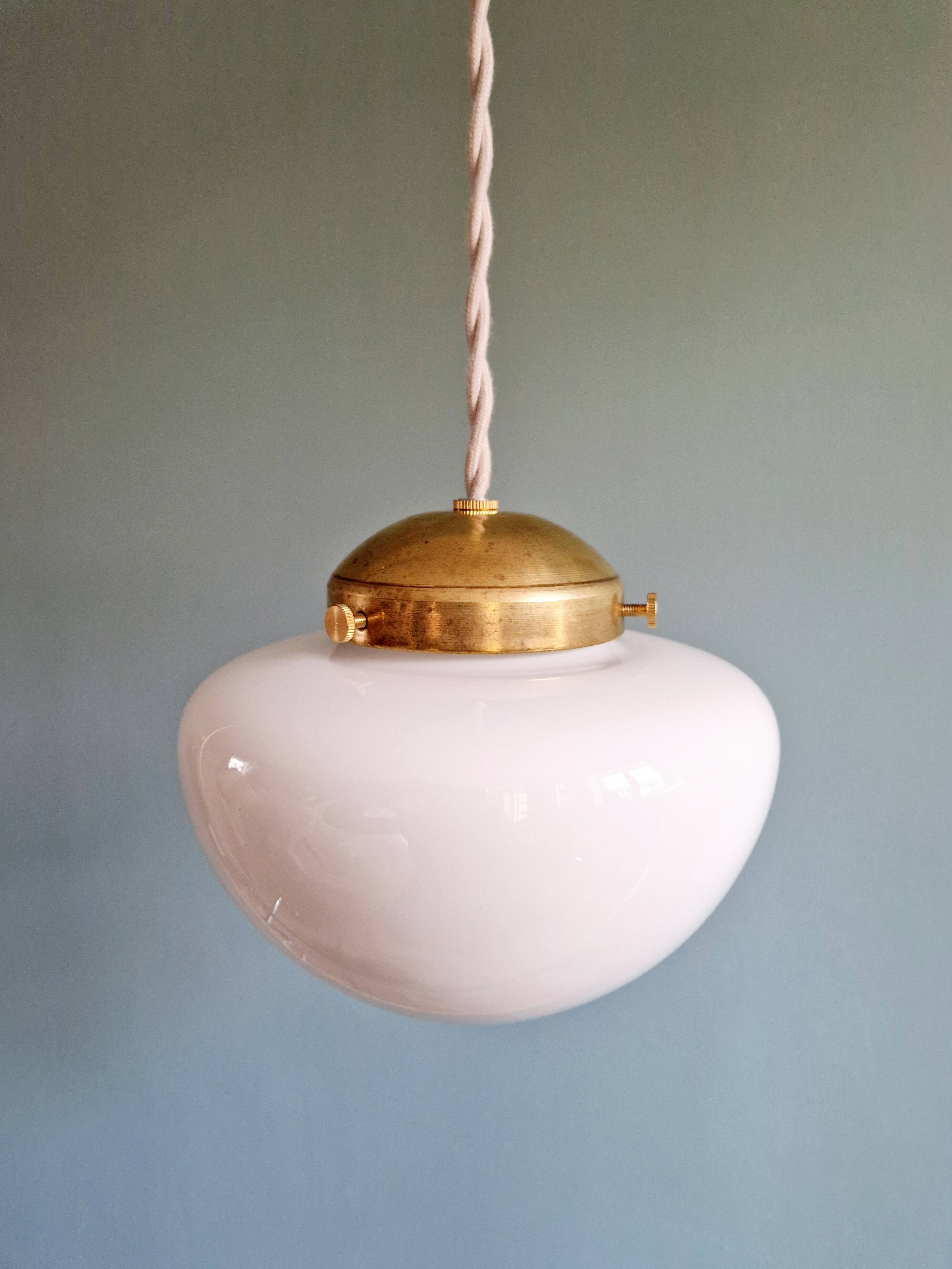 Duo of Art Deco suspensions in white opaline, 1920s-30s