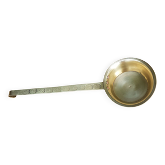 Old brass ladle