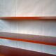 String shelf by Nisse Strinning with three mahogany shelves. Gungrey metal sides.