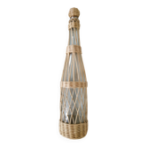 Glass and rattan bottle