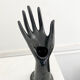 Black ceramic ring hand