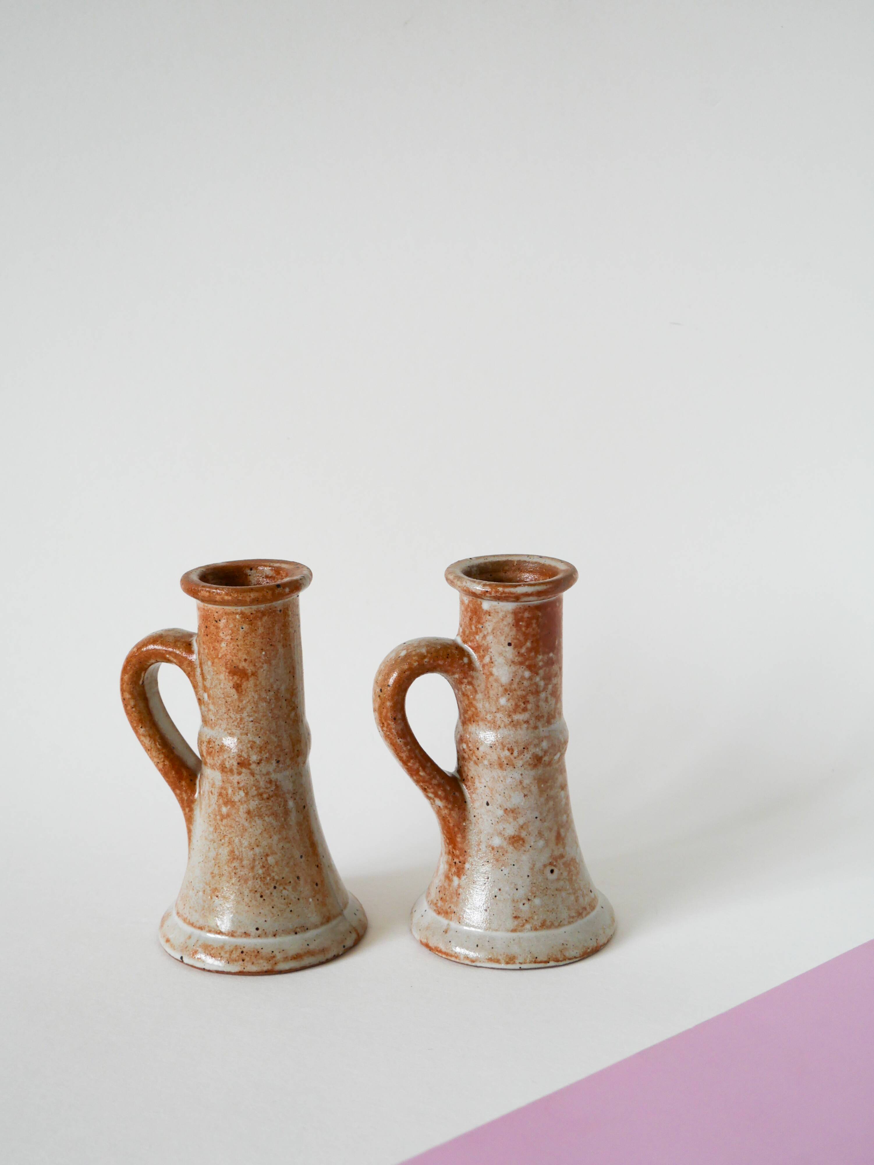 Pair of glazed sandstone candlesticks, 1970