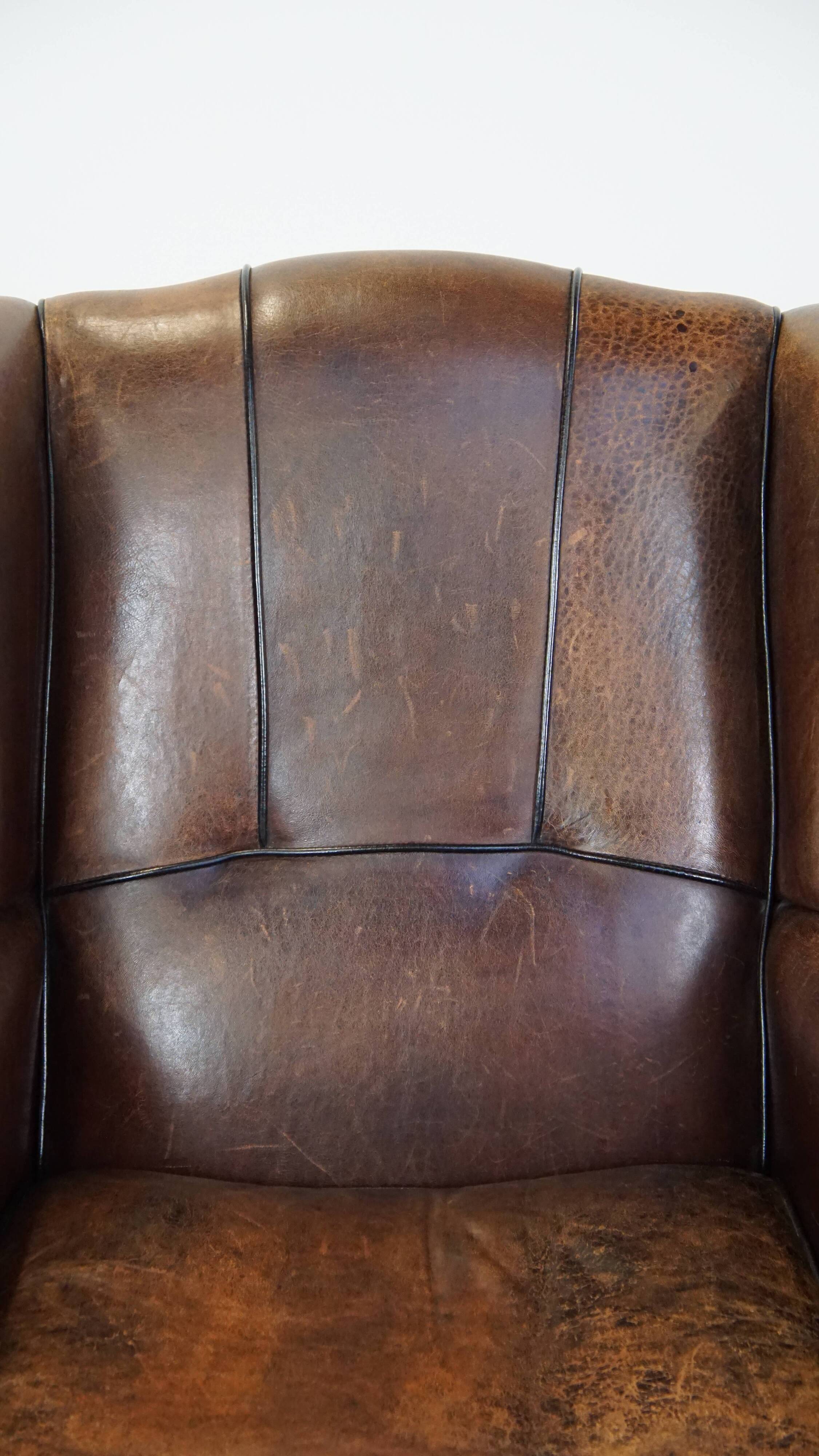 Sheep leather wing chair with patina