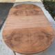 Extendable round dining table with central leg renovated in raw wood 205cm