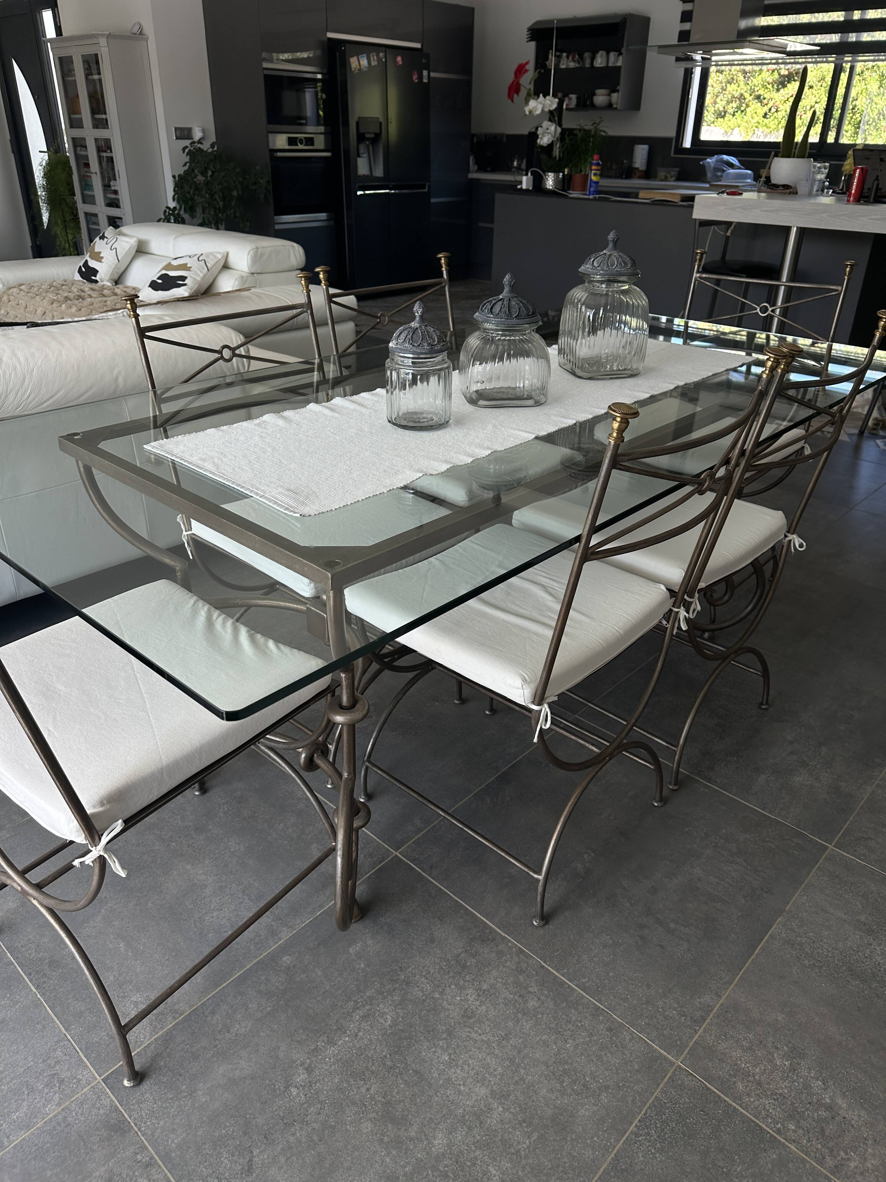Roche Bobois glass and steel dining table and 6 chairs