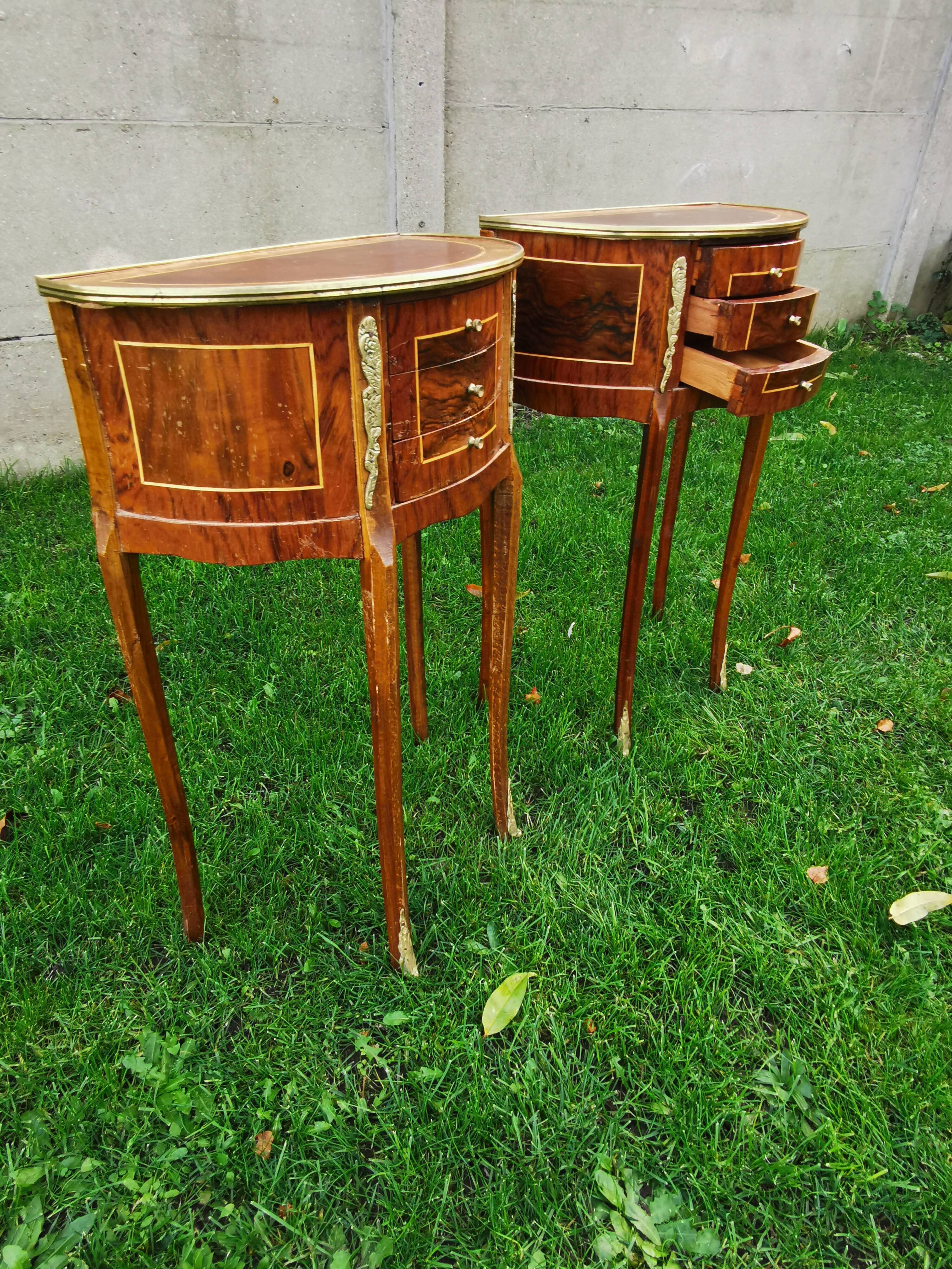 half-moon bedside pair in marquetry, bronze ornaments
