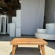 Coffee table in blond teak quadripod