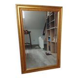 Miroir dans un élégant cadre doré. 84 x 57